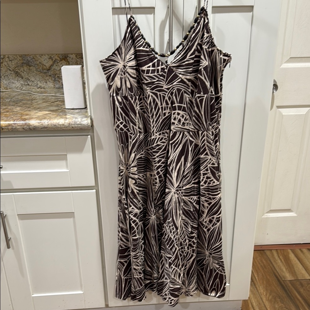 Elegant Brown and cream Floral Dress with a stunning wooden beaded detail